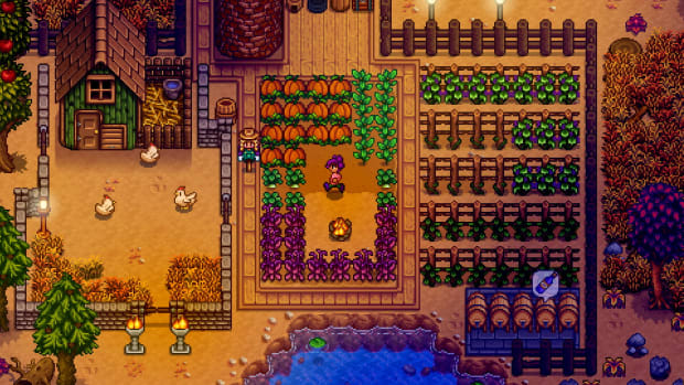 The Stardew Valley 1.5 mobile update is almost ready: A pixel person with purple hair is standing in a dirt field, surrounded by pumpkins, grapevines, and other crops. A green chicken house is nearby, illuminated by torchlight